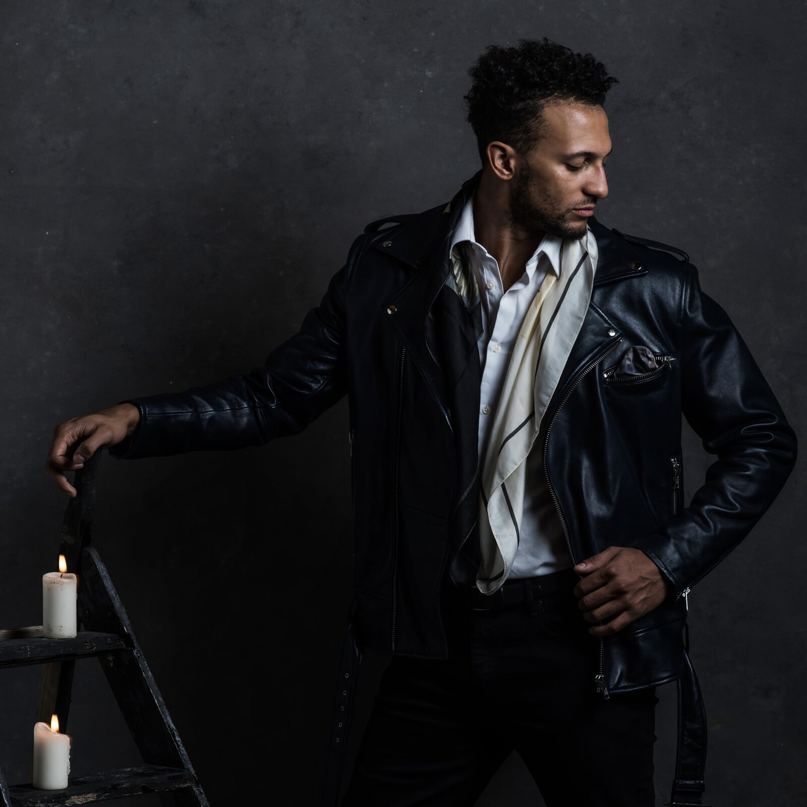 Spectre leather jacket worn, belted biker silhouette