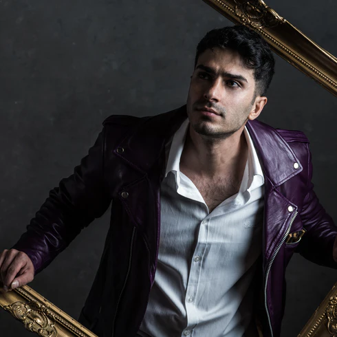 Judgement jacket worn — model framed in gilded baroque frame
